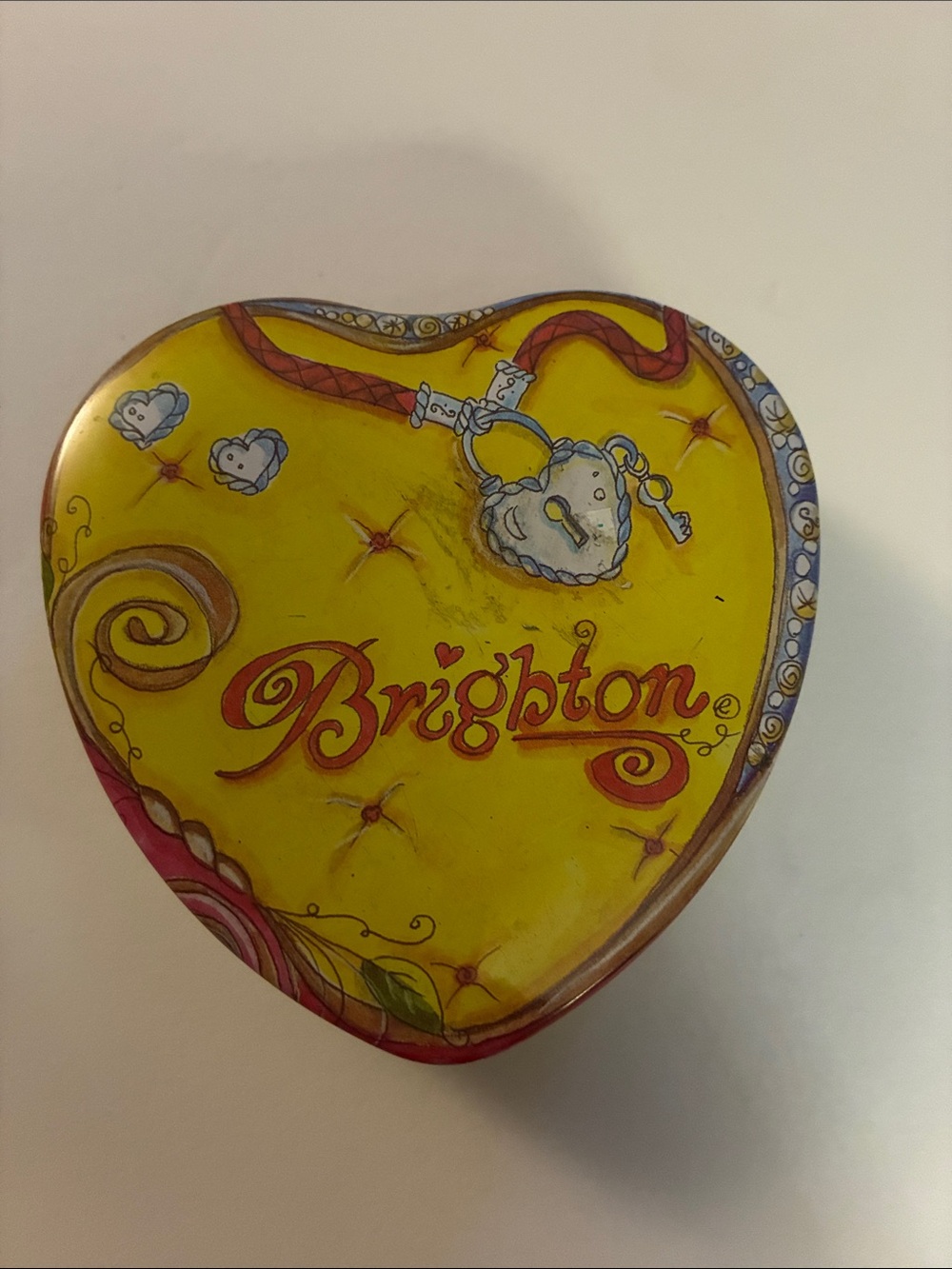 Vintage Brighton heart tin